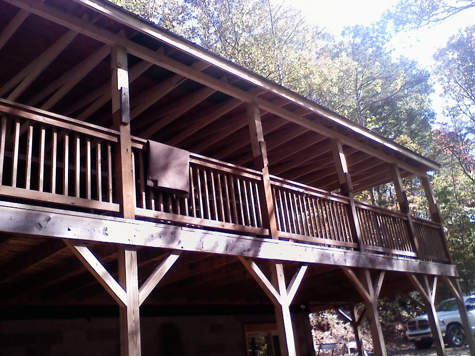 Timber framing under a new elevated porch and deck — Roof Leak Repair in Orion by Roofing Brothers